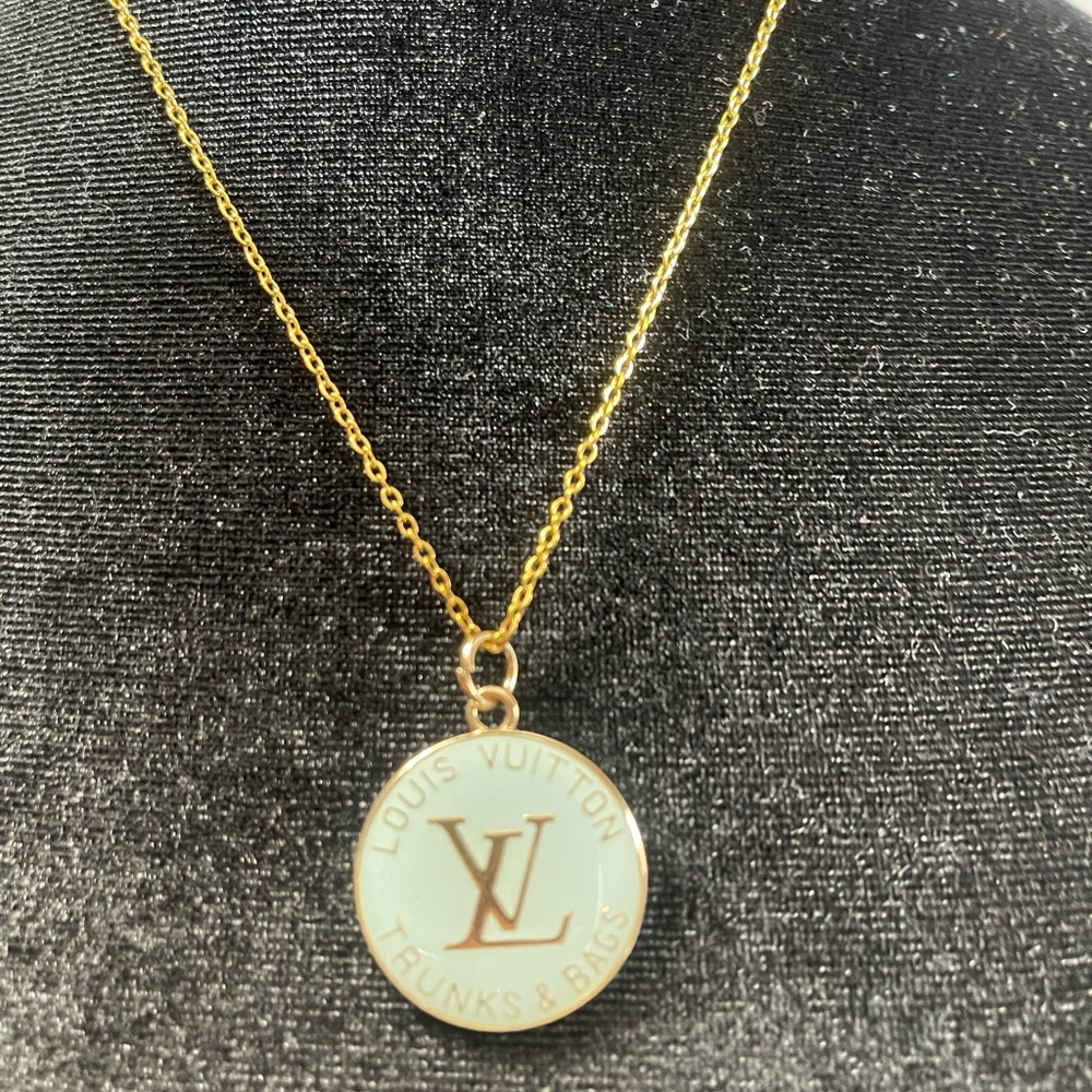 Louis Vuitton zipper pull - authentic- on 18” sterling silver chain